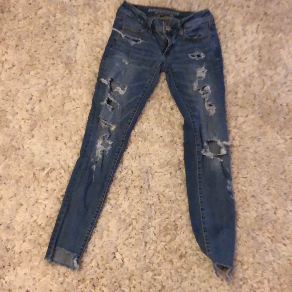 Ripped blue jeans